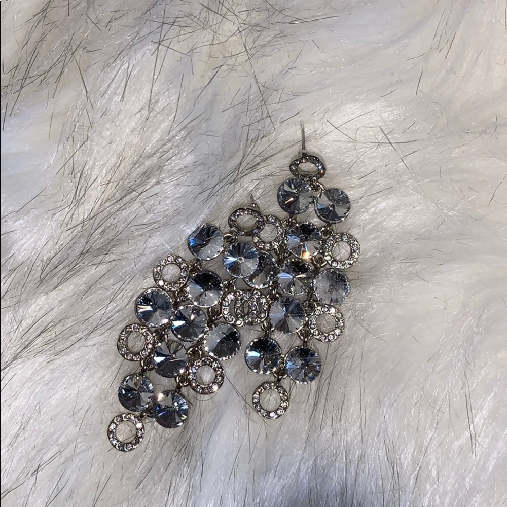 Dangling earrings. No backs